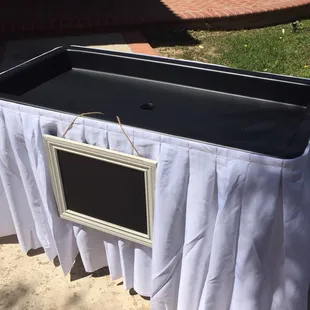 Little Chiller Table includes black or white linen. GREAT for drinks and keeping food items cold! (Chalkboard NOT included)