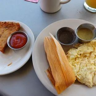 Pork tamale with scrambled eggs and Brasil&apos;s version of hash browns.
