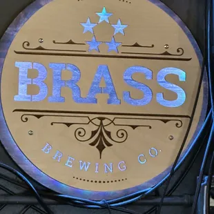 a sign for brass brewing