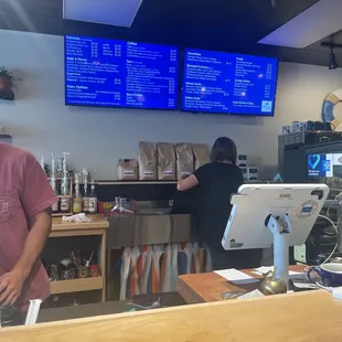 a man standing at the counter