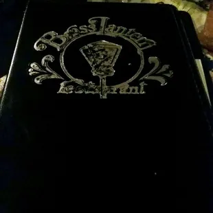 the logo on a black book