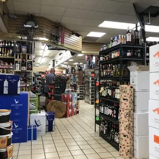 a wide aisle of liquor
