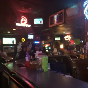 a man standing at a bar