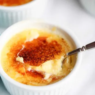 a close up of a bowl of creme
