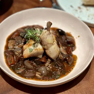 a bowl of stew with meat and vegetables