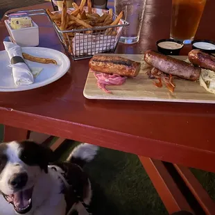 Brat Board and French Fries with two dipping sauces, on their dog friendly patio.