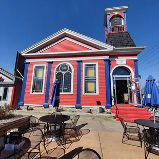 a bright red and blue building