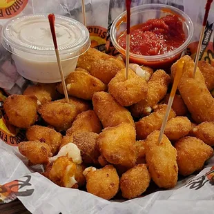 Fried cheese curds with ranch and marinara