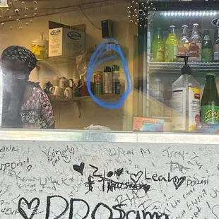 a window with graffiti on it
