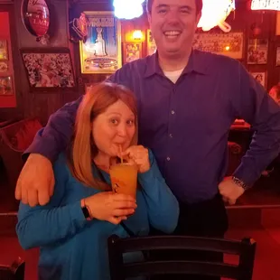 a man and a woman posing for a picture