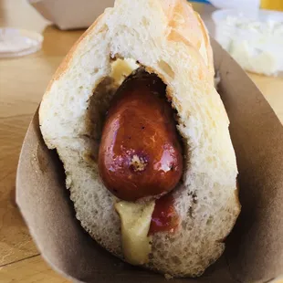 a hot dog in a bun