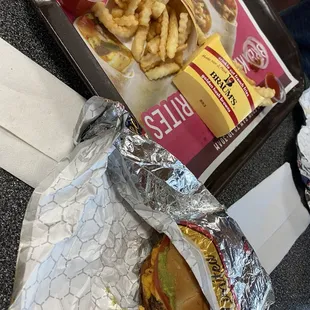 Double jalapeño pepper, jack cheeseburger, and California chipotle burger with fries