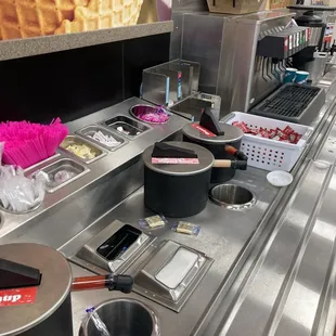 Empty cups need to coke machine which had no ice