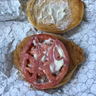 This is my grilled chicken sandwich with tomato only. NOT. It's not grilled and is covered with mayo.