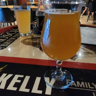 a glass of beer on a table