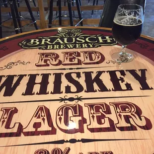 a glass of beer on a table