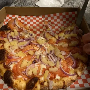 Medium pizza 12", about $12 + 4 toppings at $2/topping =$22 with taxes