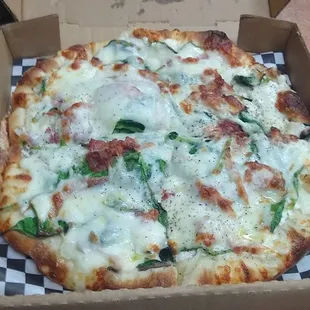 Pizza Bianca, loaded with spinach!