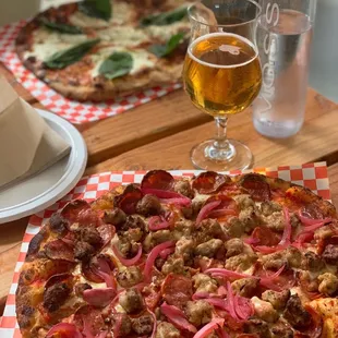 Meaty Boy pizza with strawberry fields IPA