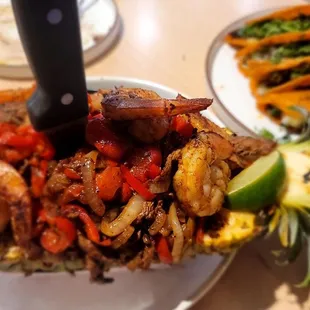 Pineapple Bowl with steak and shrimp