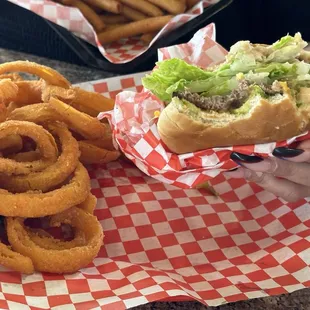 Avocado burger with onion rings!