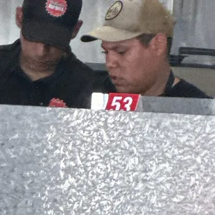 The guy in the beige hat. He is the NO MAN TO EVERY REQUEST.