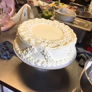 Cake pre-fruit. The fruit is put on right before pickup to ensure freshness.
