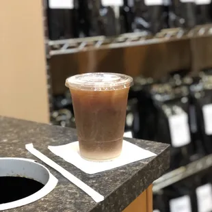 a cup of coffee on a counter