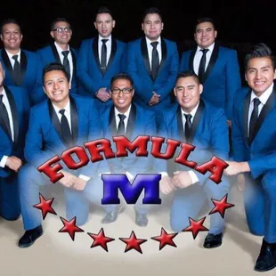 a group of men dressed in blue suits