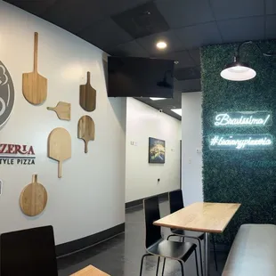 Pizza, pale wall.