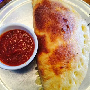 Cheese and pepperoni calzone.