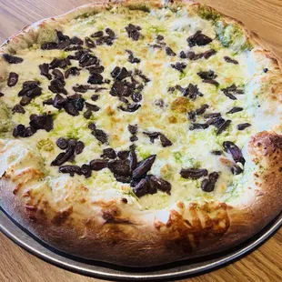 Large: Pesto, Feta Cheese, Fresh Garlic &amp; Olives.