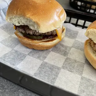 Beef slider, with grilled onions, bacon and bbq sauce