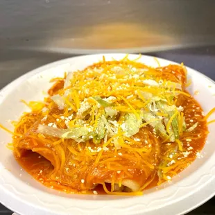 Chicken enchiladas! They can be all cheese, beef, or carne asada!