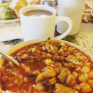a bowl of soup and a cup of coffee