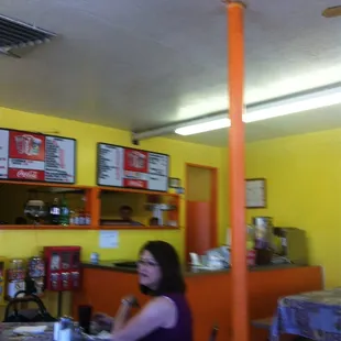 a woman sitting at a table