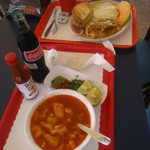 a bowl of soup and a sandwich