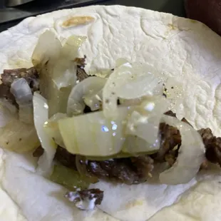 Stale tortillas and uncooked onions.