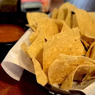 There chips come with warm hot sauce. I prefer mine chilled. The chips were thick and hearty meant for thicker sauce.