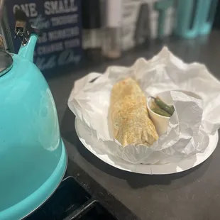 a taco and a tea kettle