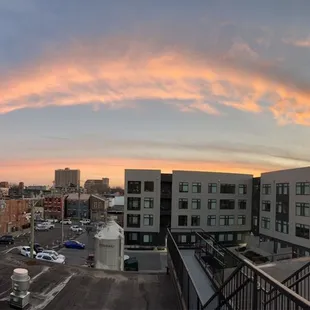 a sunset over a city