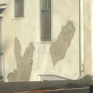 Side of one of the houses in Westerville, that hole was left open for months before they put new cement on it