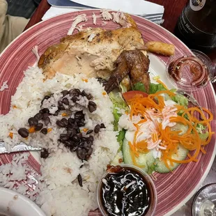 1/2 Chicken, white meat, beans, rice, salad. Sweet BBQ sauce. So good.