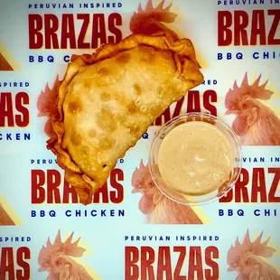 Brazas Chicken and Cheese Empanada with our Pinky Sauce