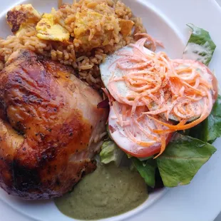 I plated my take-out up as soon as I got home.A quarter chicken, fried rice,  green sauce and a tasty salad.