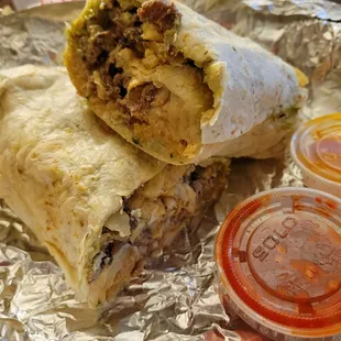 a burrito wrapped in tin foil