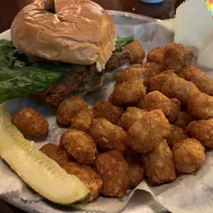 Pork schnitzel Tuesday special with cracked pepper tater tots.