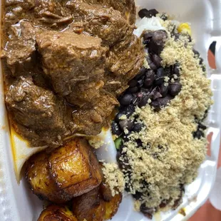 a close up of a meal in a styrofoam container