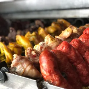 Home made pork sausage, chicken wrapped with bacon, etc at the rotisserie...part of the buffet