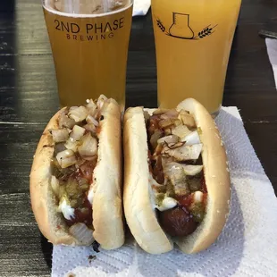 two glasses of beer and a glass of beer